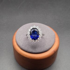 Sterling Silver Blue sapphire and CZ halo ring.  Size 9